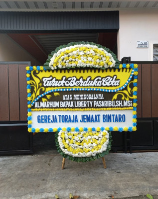 Papan Bunga Duka di Kutabumi